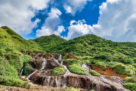 Golden Waterfall - Famous nature landscape of Jinguashi, shot in in Ruifang District, New Taipei City, Taiwan.の写真素材