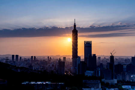 TAIPEI, TAIWAN - APR 9, 2022: Taipei cityscape during sunset hours with foregroundのeditorial素材