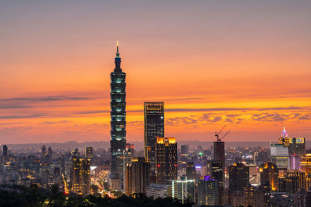 TAIPEI, TAIWAN - APR 9, 2022: Taipei cityscape during sunset hours with foregroundのeditorial素材