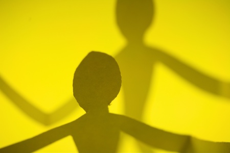 small rudimentary figures of man in paperの写真素材