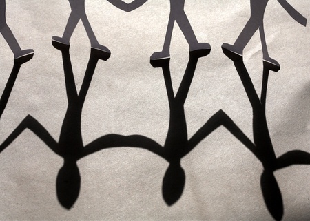 small rudimentary figures of man in paperの写真素材