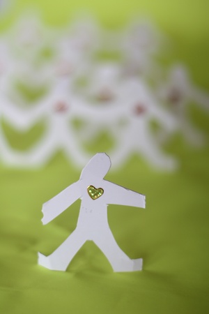 small rudimentary figures of man in paperの写真素材