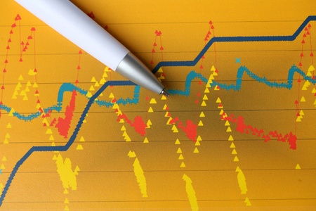 data on paper with penの写真素材
