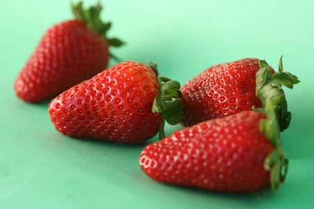 strawberries compostion, few fruits on neutral backgroundの写真素材