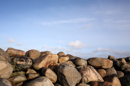 stones in the water in denmark on the north coast of the seeland islandの写真素材