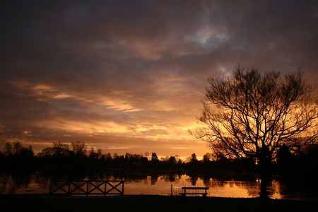 a lake in denmark at sunsetの写真素材