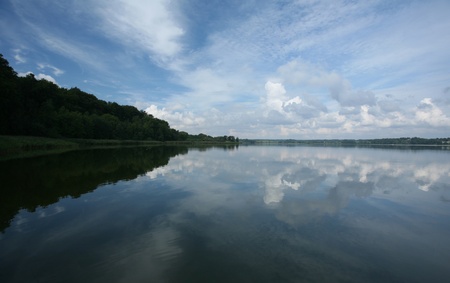  a lake in denmark with blue cloudy skyの写真素材