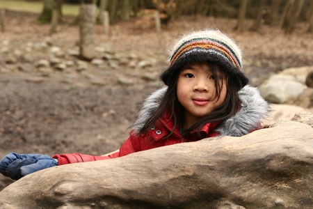 child with hat in winterの写真素材