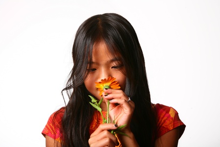 Portrait of young asian child on white backgroundの写真素材