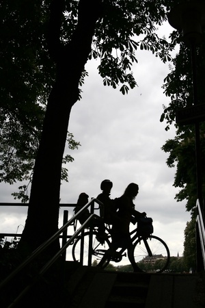 people in copenhagen denmark. Shot against the light busy people seem to be part in a geant urban theater  
の写真素材
