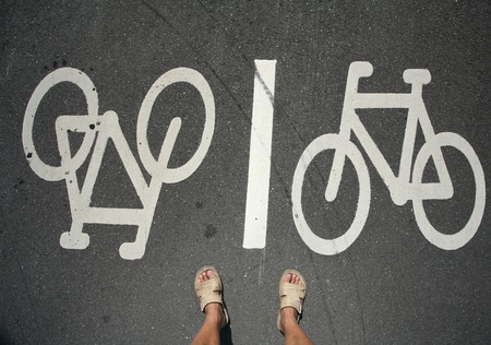 a bike sign on the roadの写真素材