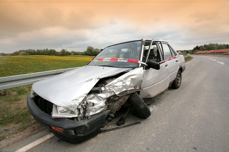 Car crash in denmark, accidented car parked on the road side