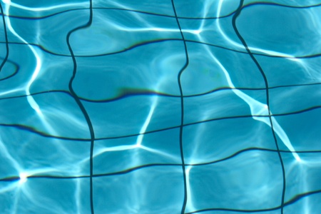 Blue water of a pool in greece in the sumer