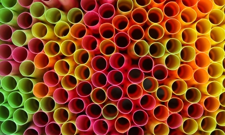 Close up picture of many colorful straws