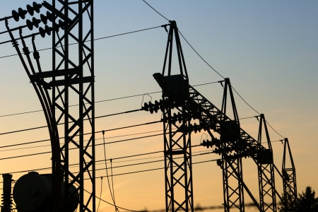 electric  plant in denmark, wires at sunsetの写真素材