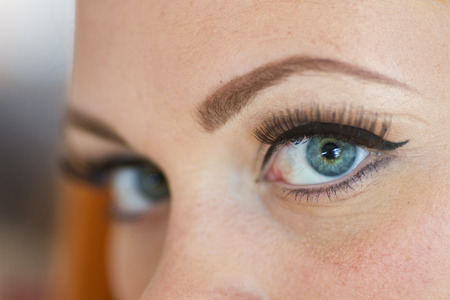 Red hair girl in pin-up style portraitの写真素材