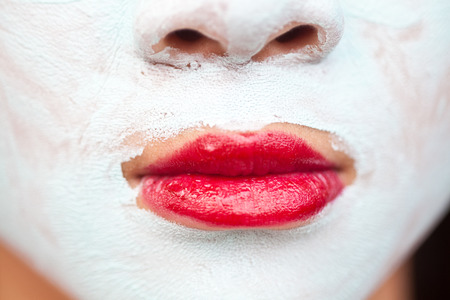 Young cute girl with a self made beauty maskの写真素材