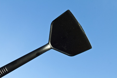 kitchen utensil against a dark blue skyの写真素材