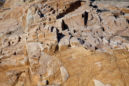 Rocks at the beach in Algajola Village or town in  Corsica in the Balagne arean the summerの写真素材
