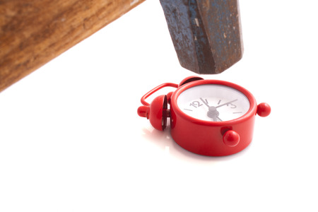 Hammer knocks the alarm isolated on a white backgroundの写真素材