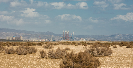 Salt lake in Limassol with port in the backgroundの写真素材