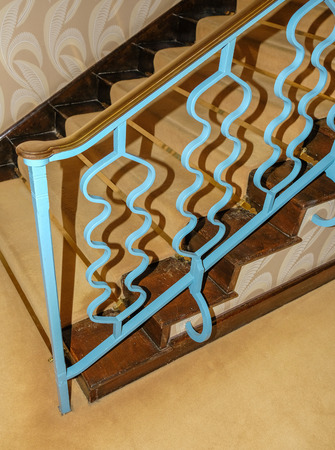 Art deco stair railing painted bright blueの写真素材