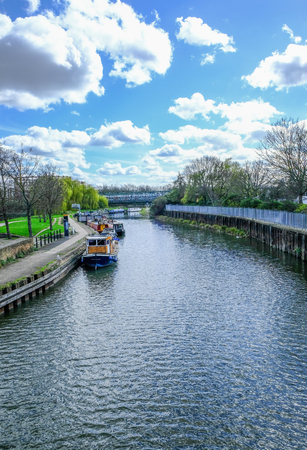 River Lea at Bow with longboats moored, a springtime shot.の写真素材