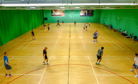 Redbridge, Essex - June 6, 2017:  Social badminton at the sport's centre in Redbridge with players on court.のeditorial素材