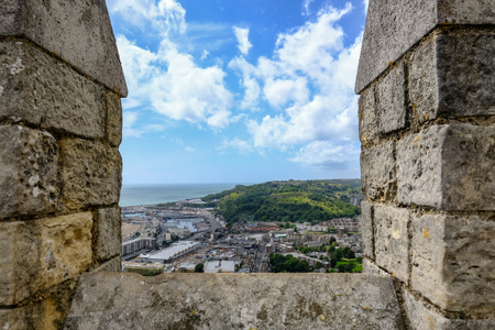 Dover Castle, Kent, UK - August 18, 2017: View from the top of the castle wall.  Aerial shot of the surrounding countryside and dock.のeditorial素材