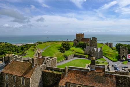 Dover Castle, Dover, Kent, UK - August 17, 2017:  Aerial view from the top of the Castle keep looking at St. Mary church and out to sea.のeditorial素材