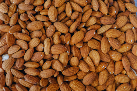 Lots of loose almonds without their shells.  Natural and organic.の写真素材