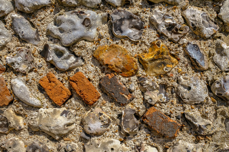 Close up background shot of an old flint wall commonly found in Sussex.の写真素材