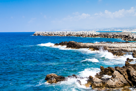 Waves breaking on the rocky coast of the Mediterranean Sea (Sea of Crete) near the Fortress (Fortezza) of Rethymno  Coast of Kolpos Almirou, Crete, Greeceの写真素材