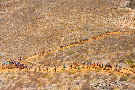 People climbing the hill on Gramvousa Island. Crete, Greeceのeditorial素材