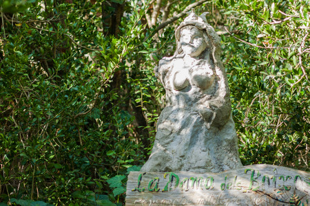 LLUC, MAJORCA, SPAIN - OCTOBER 18, 2017: Statue of La Dama dels Boixos (The Lady of Boxwood) in LLuc botanical gardenのeditorial素材
