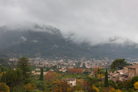 View of Biniaraix, a small village in Soller Valley surrounded by the Serra de Tramuntana mountains. Majorca, Spainの写真素材