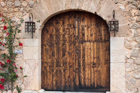 ESTELLENCS, SPAIN - DECEMBER 3, 2017: Beautiful old door in Son Serralta de Dalt. Estellencs, Majorca, Spain.のeditorial素材