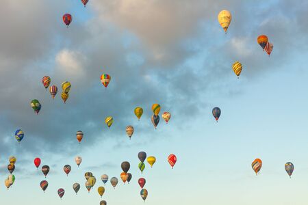 Manacor, Mallorca, Spain - October 27, 2019:  FAI European Hot Air Balloon Championship in Spain. Lots of hot air balloons in the airのeditorial素材