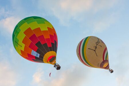 Manacor, Mallorca, Spain - October 27, 2019:  FAI European Hot Air Balloon Championship in Spain. Hot air balloons in flightのeditorial素材