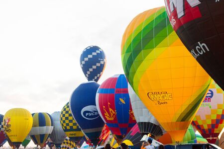 Manacor, Mallorca, Spain - October 27, 2019:  FAI European Hot Air Balloon Championship in Spain. Balloons rising up in the airのeditorial素材