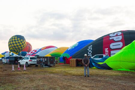 Manacor, Mallorca, Spain - October 27, 2019:  FAI European Hot Air Balloon Championship in Spain. Balloons during inflation on the groundのeditorial素材
