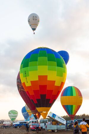 Manacor, Mallorca, Spain - October 27, 2019:  FAI European Hot Air Balloon Championship in Spain. Balloons rising up in the airのeditorial素材