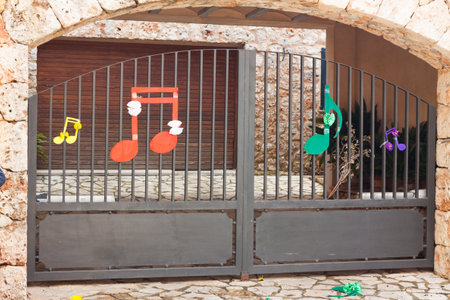 Metall gate decorated with some musical notes on "Costitx en Flor" (Costitx in bloom) Flower Fair, Majorca, Spainの写真素材
