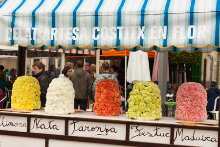 COSTITX, MAJORCA, SPAIN - MAY 1, 2018: Cart, selling artisan ice cream and decorated with flowers, at "Costitx en Flor" (Costitx in bloom) Flower Fair, Majorca, Spainのeditorial素材