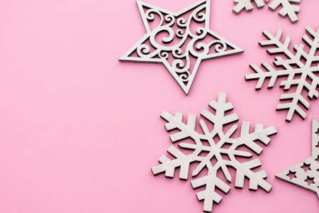 Christmas and New Year. Pink flat lay frame with snowflakes. Copy spaceの写真素材