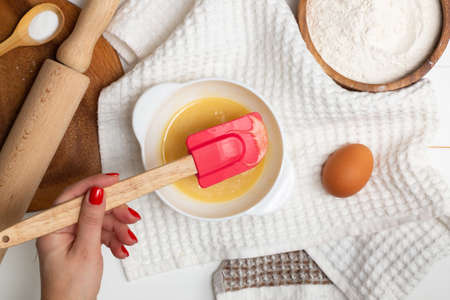 Step-by-step heart-shaped cake recipe instructions. Step 2. Melt butter, sugar, and honey. Add egg...
