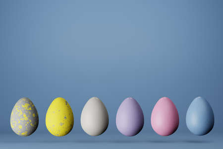 Row of six Easter eggs in trendy colors 2021 on blue background, copy space. 3D render