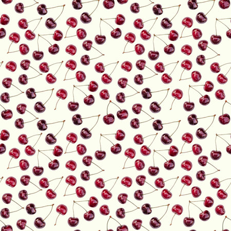 Seamless endless pattern of bright ripe red sweet cherries isolated on white backgroundの写真素材