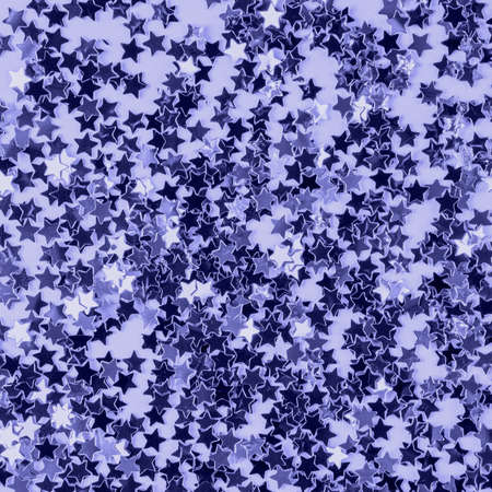 Color of the Year 2022 Very Peri. Trendy background made of shiny star shaped confetti. Fashion...