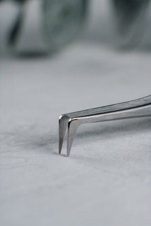 Medical surgical tweezers isolated on white background. High quality photoの写真素材